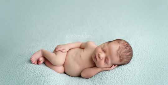 newborn boy on blue blanket in kingston portrait studio