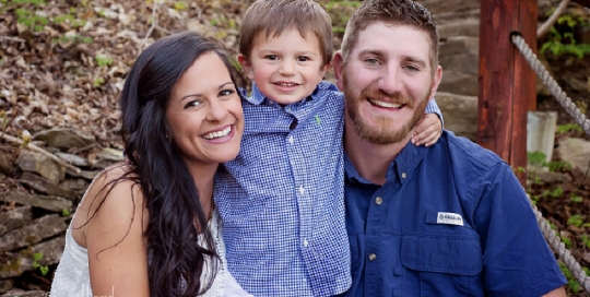 outside family portrait with little boy