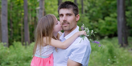 dad and daughter portrait in forest