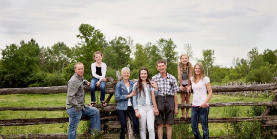 family with grandparents portraits on farm