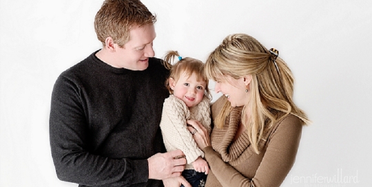 studio portrait session with parents and baby