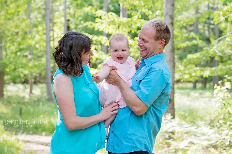 family of three in forest