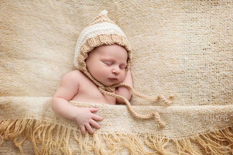 newborn infant with hat