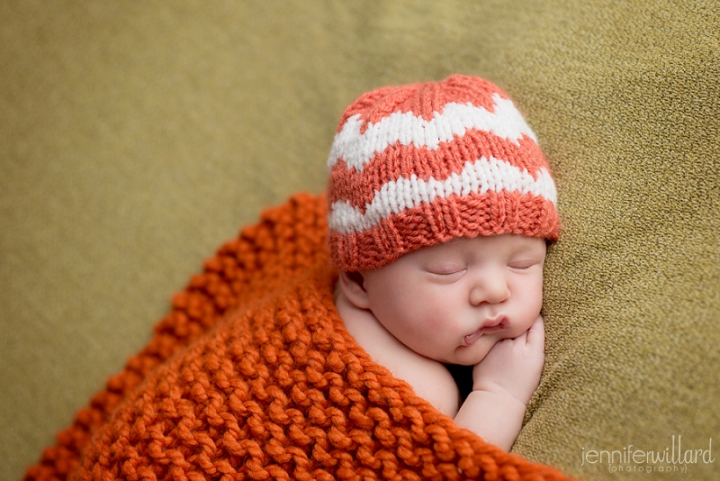 orange and green baby photographer