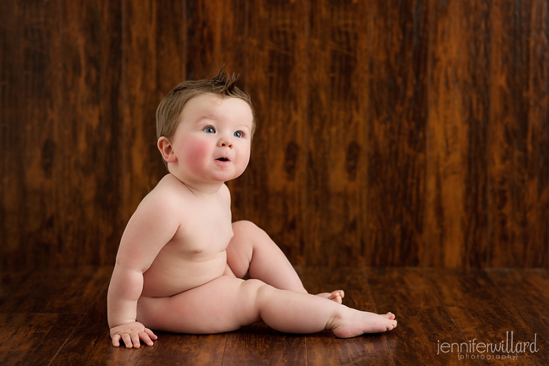 baby pictures on wood backdrop