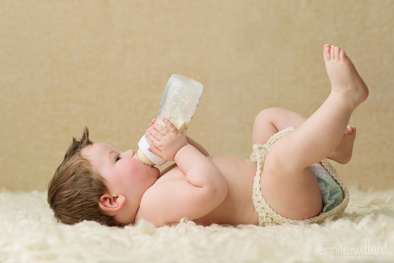 baby drinking from bottle