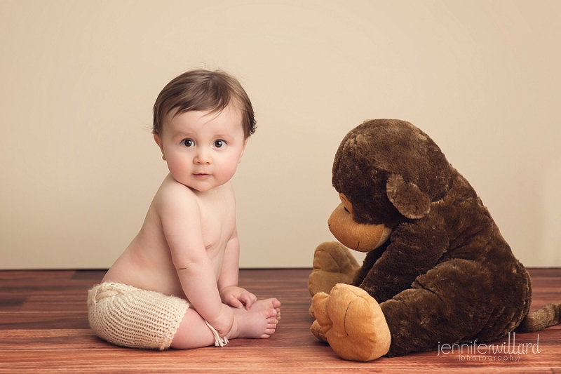 baby portrait with stuffed animal