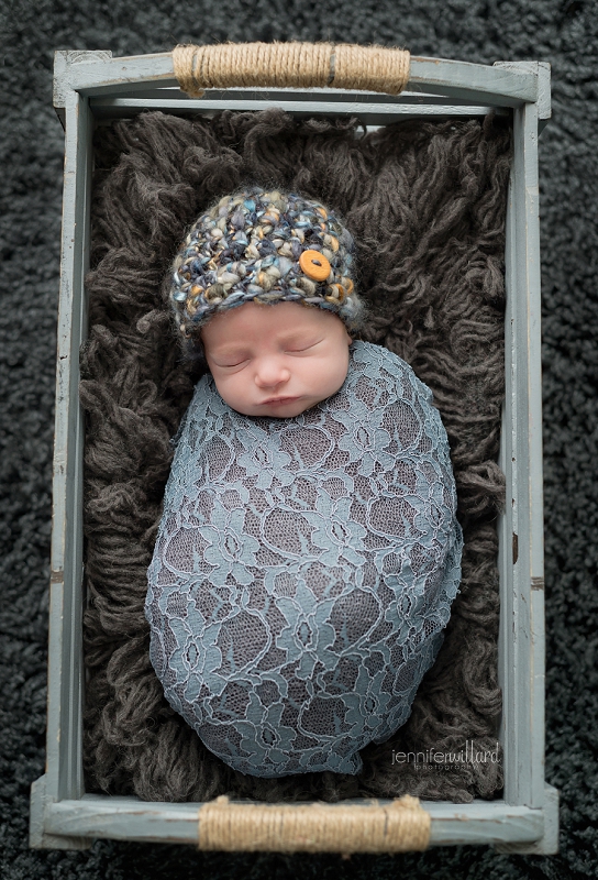 newborn pose in basket