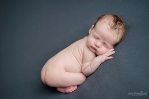 newborn photographer on grey blanket