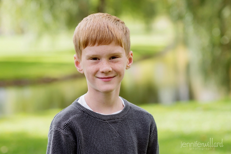 boy in park smiling