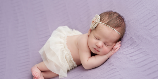 newborn-portrait-purple-blanket-white-tulle-skirt-flower-kingston