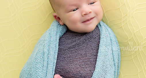 baby-newborn-boy-studio-pose-yellow-blanket-wrap-ygk