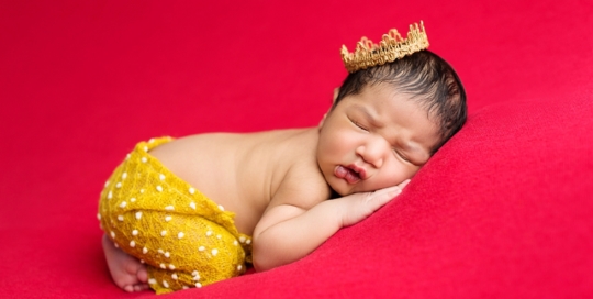 newborn-baby-boy-red-blanket-gold-crown-mustard-yellow-pants-studio-portrait-kingston-ontario-photography-studio-01