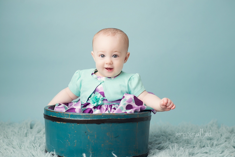 baby-milestone-first-year-blue-backdrop-purple-dress