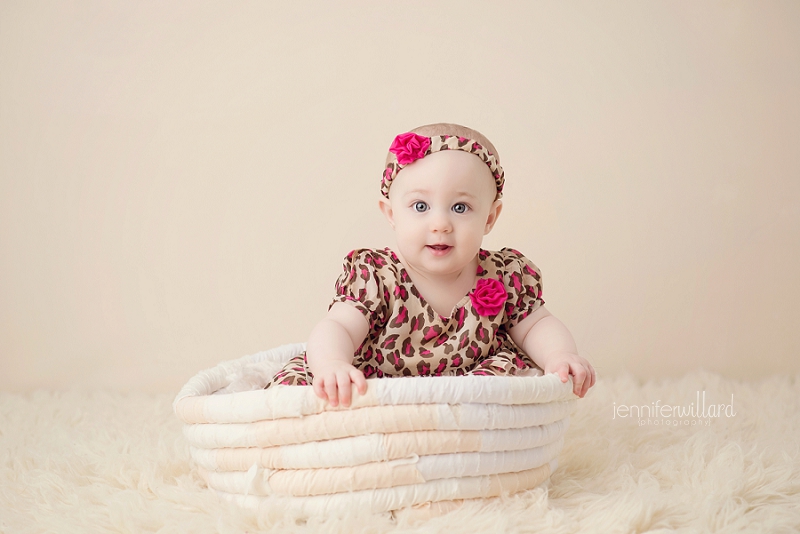 baby-milestone-6-months-old-cream-white-animal-print-portrait