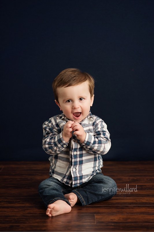 baby-boy-wood-floor-blue-backdrop-studio-portrait