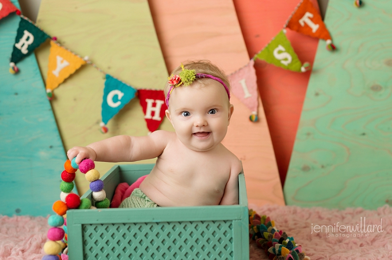 baby-girl-milestone-christmas-studio-set-colourful-trees