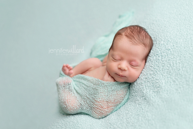 baby-boy-back-pose-studio-blue-blanket-wrap