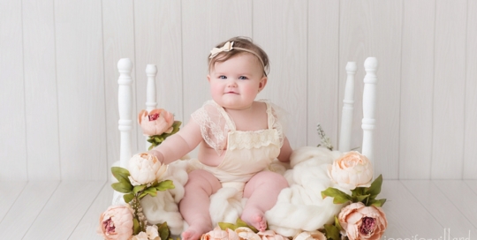 baby-portraits-flower-bed-white-wood-floor-ygk