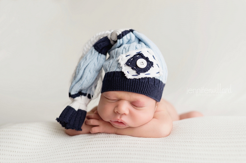 newborn-baby-photos-blue-hat-white-blanket-baby-boy