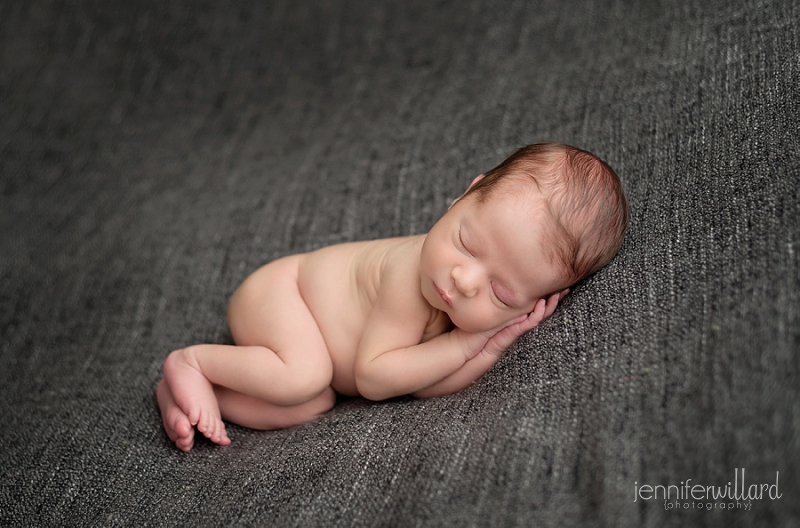 baby-side-pose-grey-blanket-studio-portrait-ygk