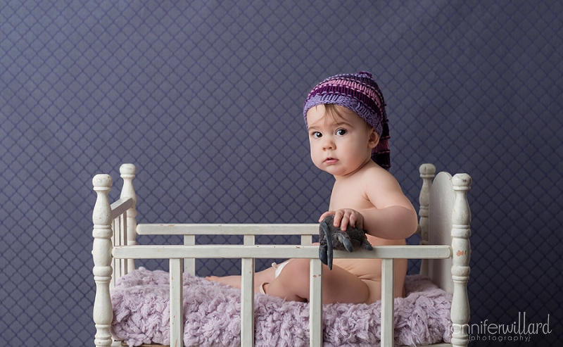 baby-girl-vintage-crib-purple-backdrop