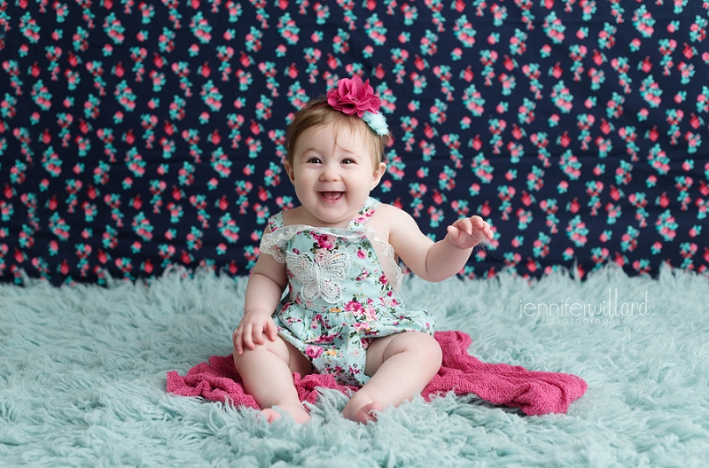 baby-portrait-pink-blue-romper-headband-backdrop-kingston-ontario-photographer