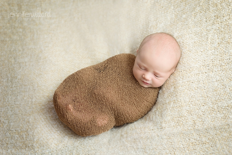 organic-neutral-baby-portrait-brown-wrap-cream-blanket-kingston-studio-photographer