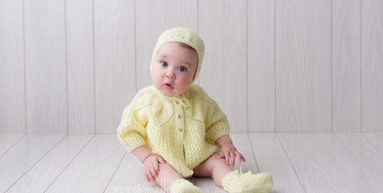 vintage baby portrait 6 month milestone photography session yellow vintage bonnet and sweater on white wood backdrop in Kingston Ontario Photography Studio_0004