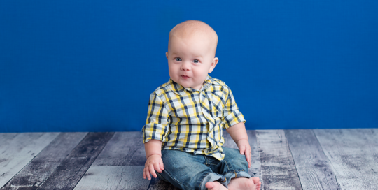 blue background and grey wood floor in kingston studio