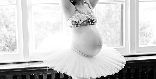 pregnant ballernia photography in tutu in Kingston at CFB Kingston Mess Hall