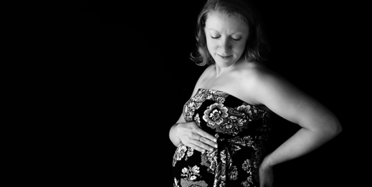 pregnant woman in studio portraits in Kingston Ontario