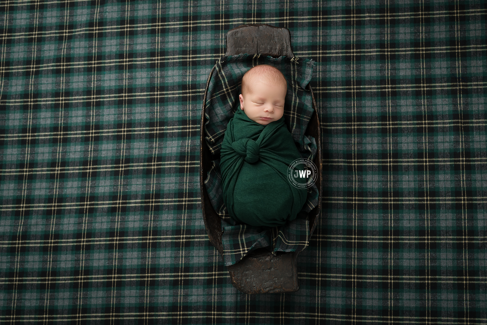 green cottage plaid blanket with baby in trench bowl in green wrap at Jennifer Willard Photography Kingston Portrait Studio