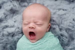 newborn baby boy blue wrap grey floakti rug yawning kingston newborn photographer