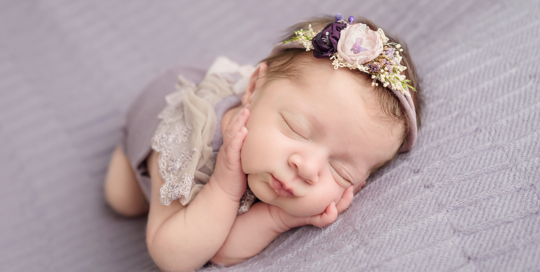 newborn-baby-girl-purple-blanket-purple-headband-flower-Kingston-Newborn-Photographer