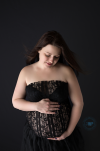 Pregnant mother in black lace dress by Kingston Maternity Photographer