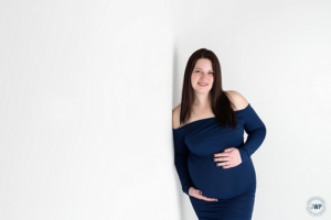 Expecting Mom in blue dress by Kingston Maternity Photographer