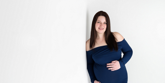 Expecting Mom in blue dress by Kingston Maternity Photographer