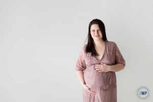 Pregnant Mom in Mauve lace dress by Kingston Maternity Photographer