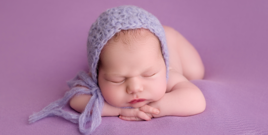 newborn girl purple blanket bonnet kingston portrait studio