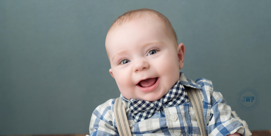 baby-boy-sitter-milestone-blue-backdrop-bow-tie-plaid-shirt-Kingston-Photographer