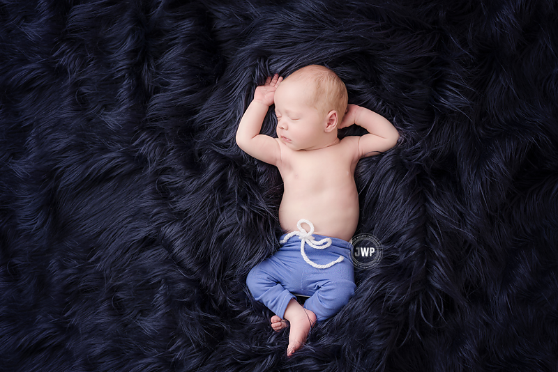 newborn-baby-boy-blue-knits-blue-flokati-Kingston-Baby-Photographer