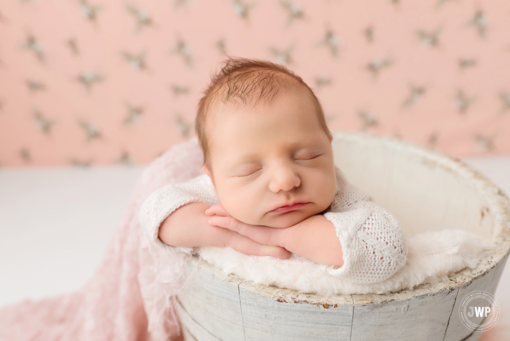 newborn baby girl in white bucket by Kingston Newborn Photographer