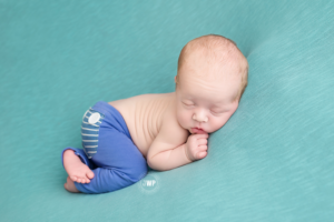 newborn-boy-blue-blanket-blue-pants-Kingston-baby-Photographer