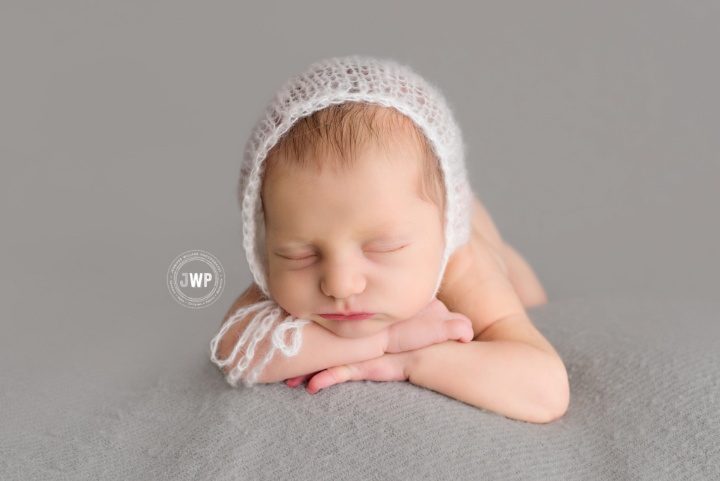 newborn girl grey blanket white hat Kingston Portrait Studio