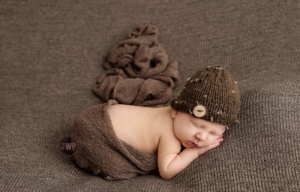 newborn posed portrait brown blanket brown hat brown wrap Kingston Newborn Photographer