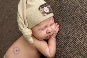 newborn posed portrait brown blanket beige hat Kingston Newborn Photographer