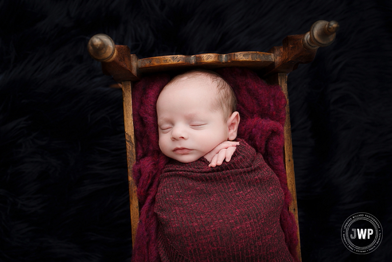 newborn posed portrait vintage cradle burgundy wrap blue fur Kingston Newborn Photographer