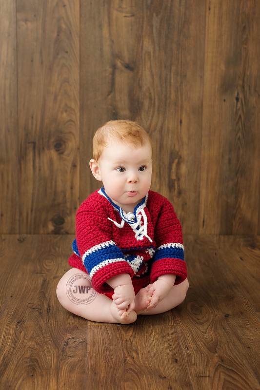 posed baby portrait 6 months old Canadian sweater Kingston Children Photographer