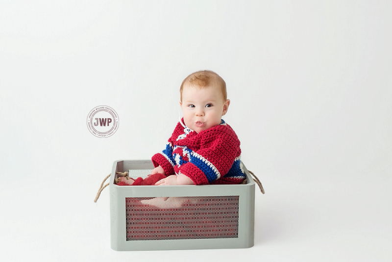 posed baby portrait 6 months old Canadian sweater Kingston Children Photographer